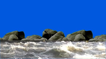 Ocean waves crashing against jagged rocks with a blue screen background for composite editing. Keywords: ocean, sea, waves, rocks, water, surf, blue screen, chroma key, crashing, splash, foam, coastli - Powered by Adobe
