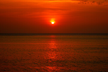 Calm Evening Seascape with Colorful Sunset Sky