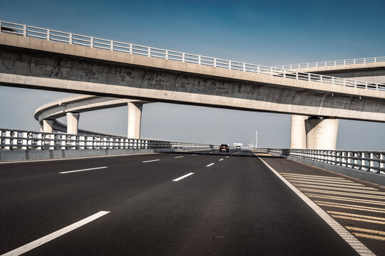 Multi-level Concrete Highway Overpass with Car