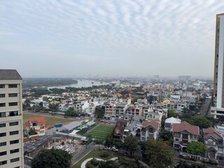 Obraz premium Saigon Aerial View: A high-level panoramic view from a top floor overlooking Ho Chi Minh City, Vietnam.