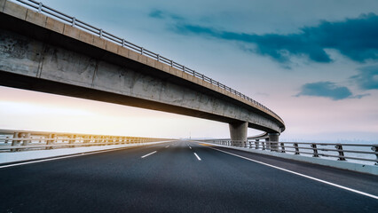 Elevated Road Overpass with Clear Sky at Sunset
