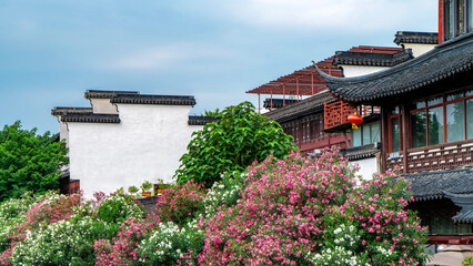 Traditional Chinese Architecture with Colorful Flowers