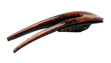 An abstract, elongated object with a striking, two-toned design, featuring a warm, woodgrain-like finish. Its futuristic appearance is enhanced by sleek black accents