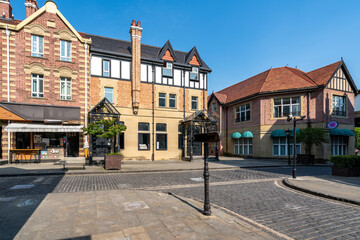 Obraz premium Quaint European-style Buildings in a Cobblestone Square