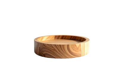 Close-up of a circular wooden vessel with a shallow well and rounded edge, isolated on a stark black background