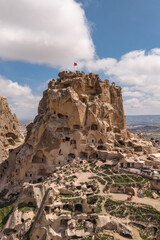Aerial view of Uchisar Castle in Cappadocia. Vertical photo