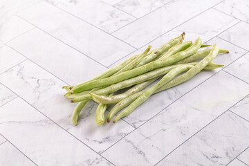 Raw green string beans heap