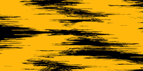 Abstract grunge texture background with dynamic black brush strokes scattered across a vibrant yellow surface