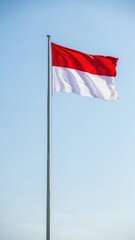 Indonesian Flag Waving Against Clear Sky
