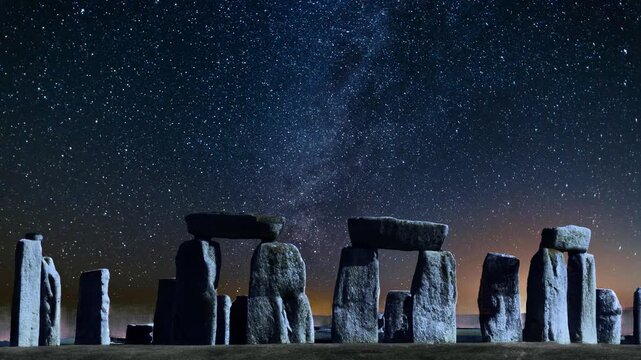 Stonehenge at night. Space background at the famous Stonehenge prehistoric monuments, a massive stone circle located on Salisbury Plain in Wiltshire, England, about 8 miles (13 km) north of Salisbury.