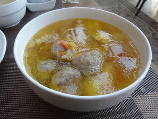 [Uzbekistan] Close-up of meatball soup(shurpa) in a white bowl (Bukhara)