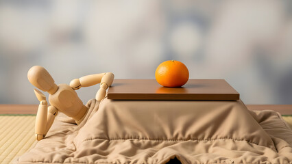 こたつでくつろぐデッサン人形