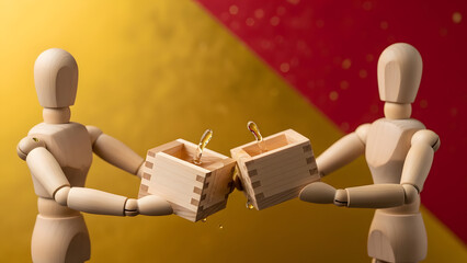 升酒で乾杯するデッサン人形