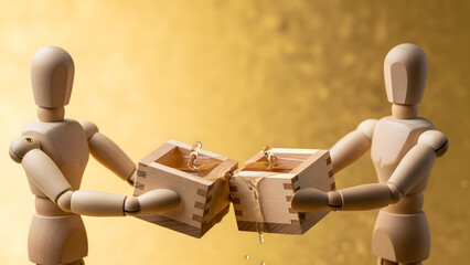 升酒で乾杯するデッサン人形