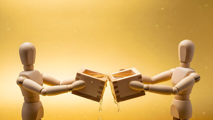 升酒で乾杯するデッサン人形