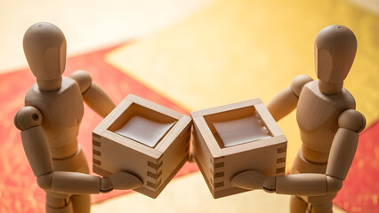 升酒で乾杯するデッサン人形