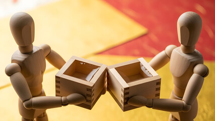 升酒で乾杯するデッサン人形