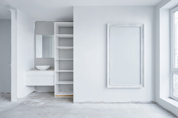 Fototapeta premium Modern bathroom under construction with white walls and minimal furniture setup in a new apartment