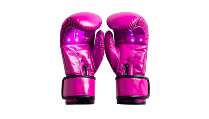 Close-up studio shot of a pair of vivid magenta boxing gloves isolated against a stark black background