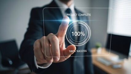 A businessman's hand touching a virtual screen displaying "Project Complete" and "100% Success" in an office setting.