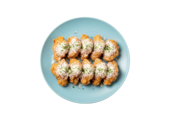 Delicious golden fried chicken wings topped with cheese and herbs