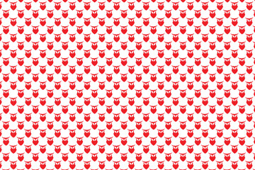 A colorful pattern of small cartoon cats on a beige background