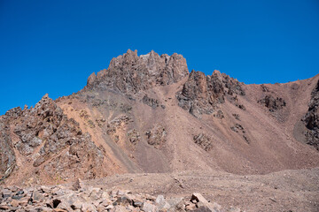 High altitude mountain landscape in August. Majestic peaks and glaciers of Trans-Ili Alatau at 3000 meters above sea level, Almaty, Kazakhstan.