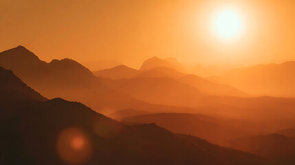 Sunlit Mountain Layers in Warm Orange Haze sunrise