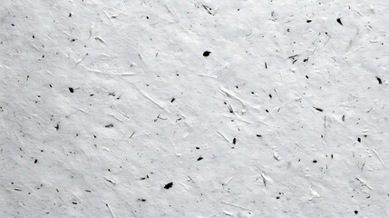 White fibrous paper texture with scattered dark elements