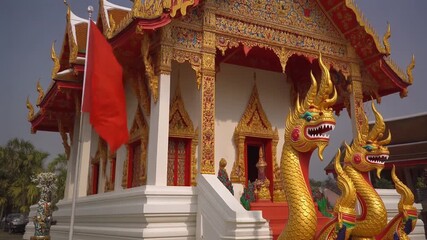 Ornate Thai Temple with Golden Nāga Guardians