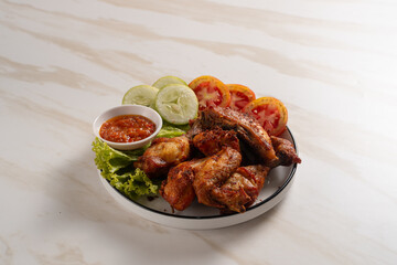 Ayam Goreng Lengkuas Kremes or Galangal Fried Chicken, One of Indonesia's culinary icons. Perfect for recipes, articles or any cooking content.