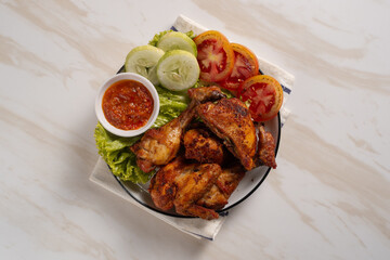 Ayam Goreng Lengkuas Kremes or Galangal Fried Chicken, One of Indonesia's culinary icons. Perfect for recipes, articles or any cooking content.