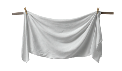 White cloth hangs, pinned to wooden bar. Laundry day, simple. Clean