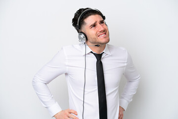 Telemarketer caucasian man isolated on white background suffering from backache for having made an effort