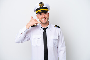 Airplane caucasian pilot isolated on white background making phone gesture. Call me back sign