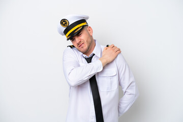 Airplane caucasian pilot isolated on white background suffering from pain in shoulder for having made an effort