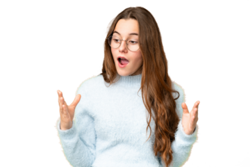 Teenager girl over isolated chroma key background with surprise facial expression