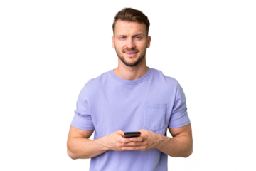 Young handsome caucasian man over isolated chroma key background sending a message with the mobile