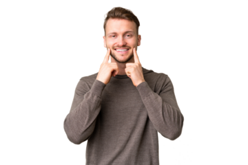 Young handsome caucasian man over isolated chroma key background smiling with a happy and pleasant expression