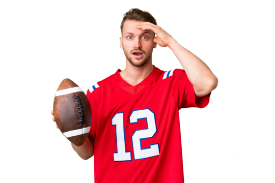 Young caucasian man playing rugby over isolated chroma key background with surprise expression - Powered by Adobe