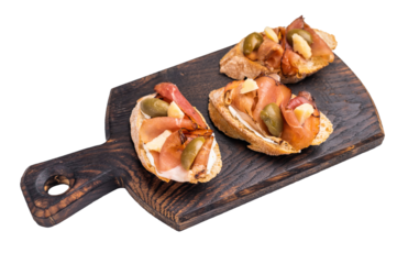 Tapa with Jamon cured ham, parmesan cheese and olives isolated on white background. top view