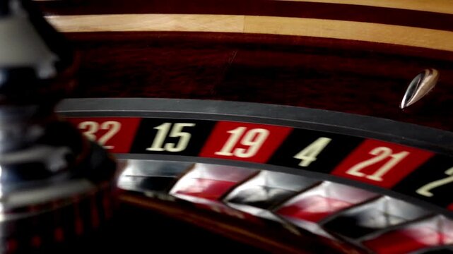 Closeup of a spinning roulette wheel in a casino setting