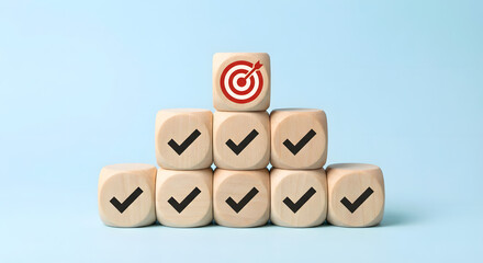 wooden blocks with check marks and target symbol