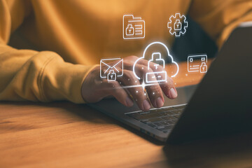 Male hand typing on laptop with cloud security and data protection icon, secure cloud computing, encrypted data storage, online privacy, cybersecurity management, digital protection technology.