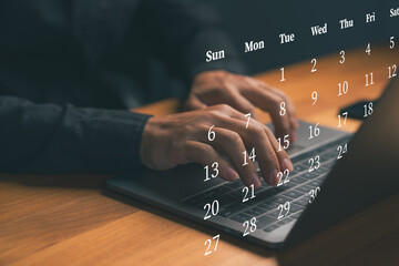 Hand typing on laptop with virtual calendar dates, representing online scheduling, time management, business planning, deadline organization, productivity workflow, and digital work efficiency concept