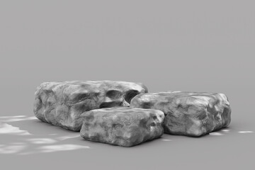 Gray stone podium display stand for product mockup with rough texture and concrete background