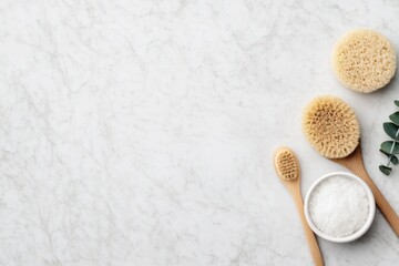 Skincare Exfoliation Ritual concept. Natural spa products on a marble countertop with brushes and salt.
