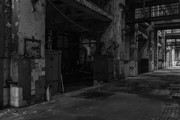 Dark abandoned industrial corridor interior