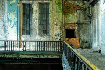 Abandoned industrial hall with debris