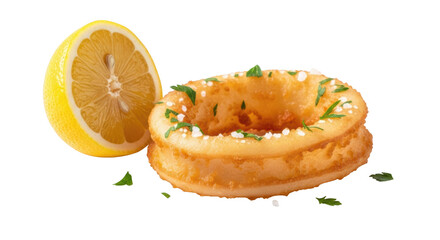 Golden fried calamari rings with fresh lemon slice and parsley garnish on black background squid rings
